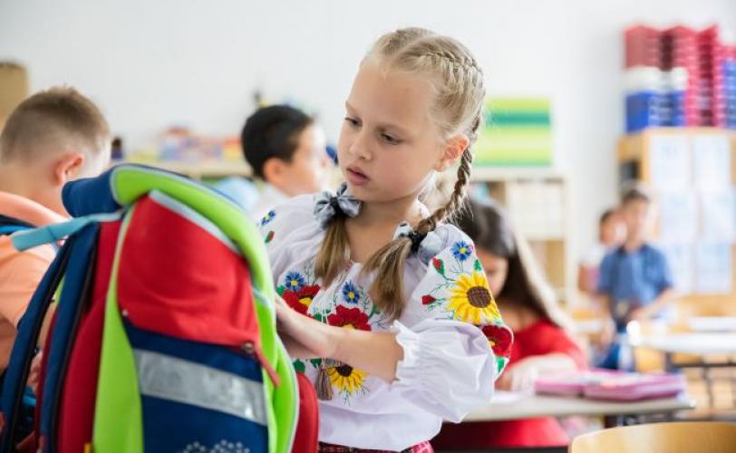 учні