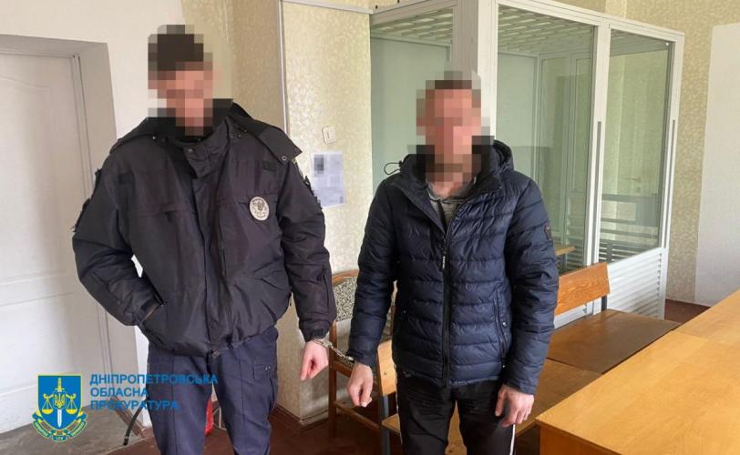катування
