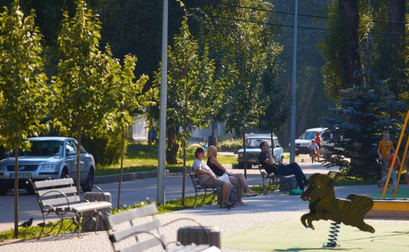 город