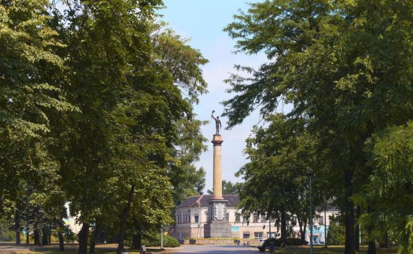 город