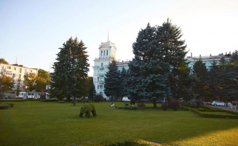 город
