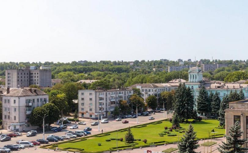 город