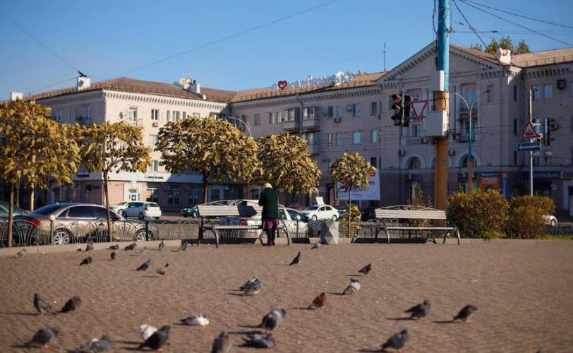 город