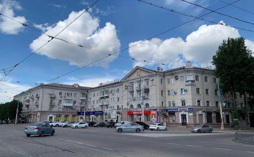 город