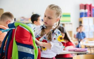 учні
