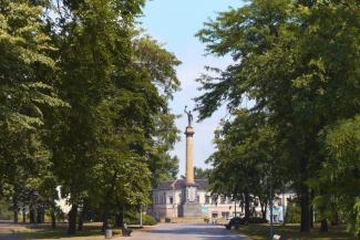 город