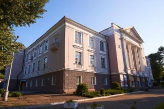 город