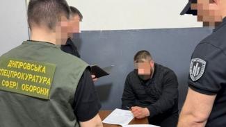 катування