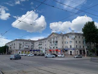 город