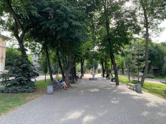 город